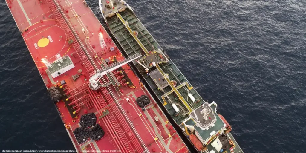 Aerial view of two vessels performing ship-to-ship fuel transfer in open waters, illustrating Baltic Bunkering Sanctions Compliance operations.